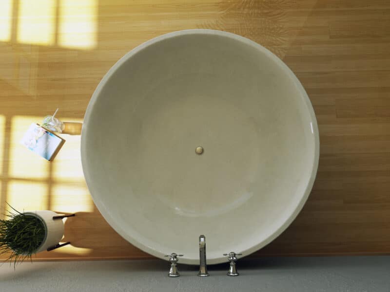 freistenede badewanne rund aus terrazzo stein