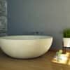freistenede badewanne rund aus stein terrazzo