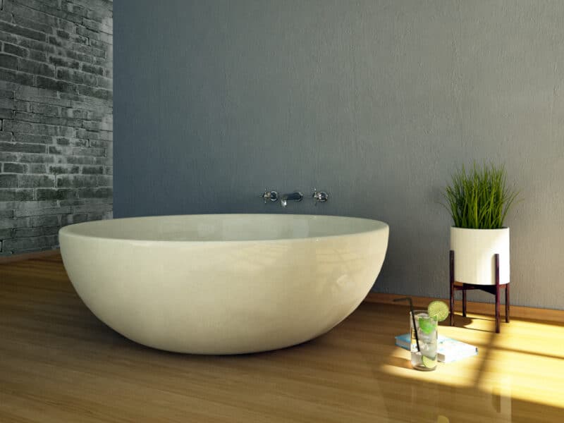 freistenede badewanne rund aus stein terrazzo