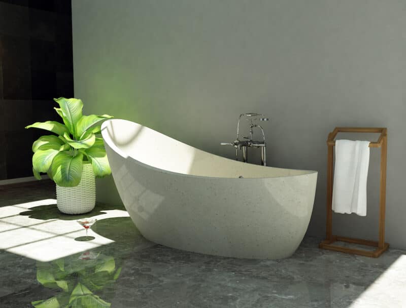 moderne freistehende terrazzo-badewanne in weiß, ideal für minimalistisches badezimmer-design